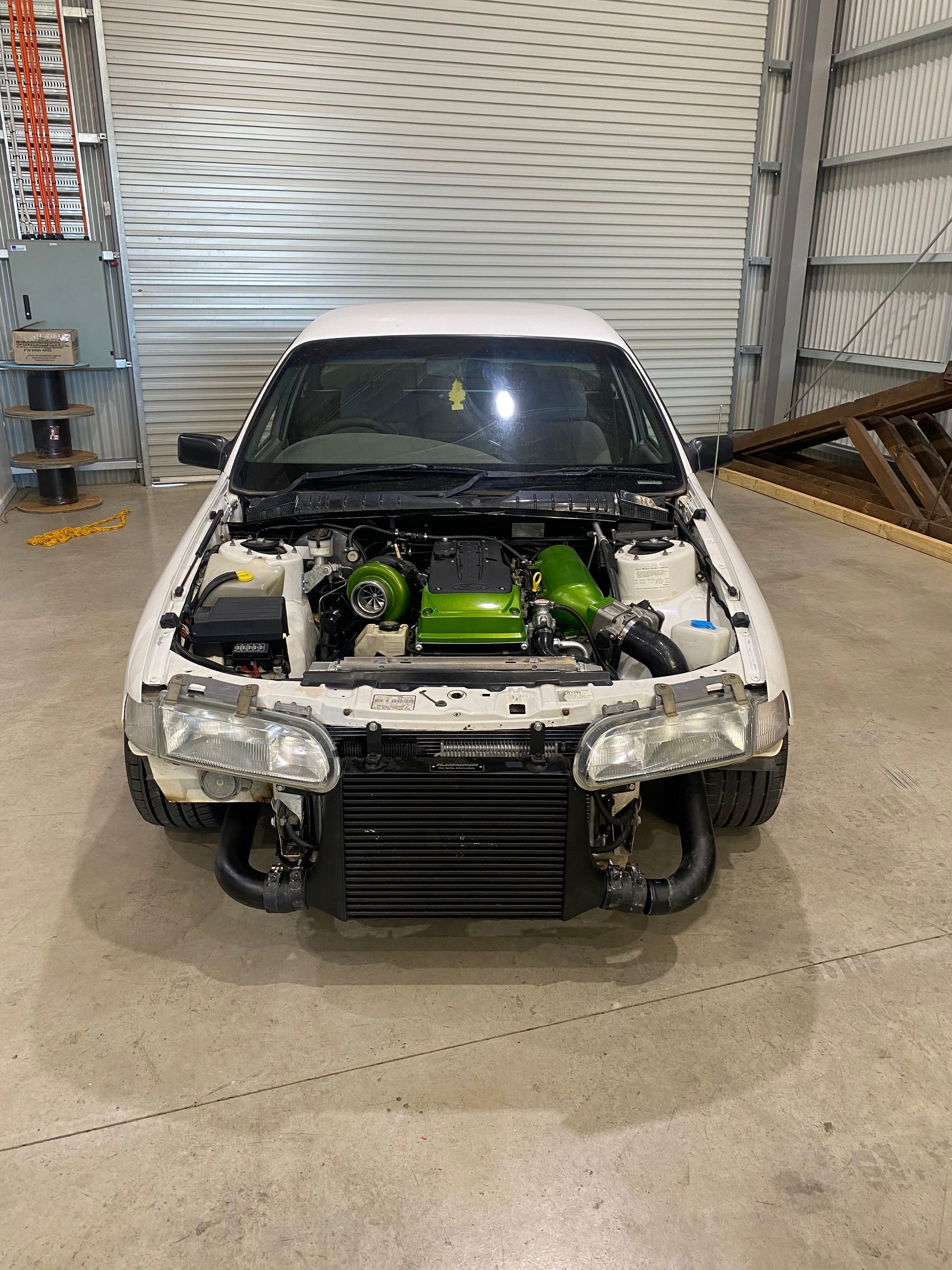 White Car with bonnet off for Engine conversion — NG Mechanical Services in Thurgoona, NSW