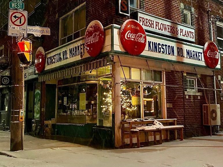 kingston rd market has coca cola signs on the front