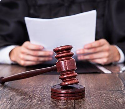 Judge Holding Documents — Grandville attorney in Grandville, MI