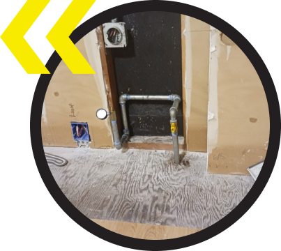 A black circle with a yellow arrow pointing to the right A black circle with a yellow arrow pointing to the right