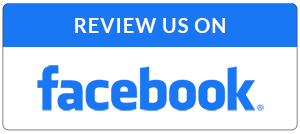 A blue and white sign that says review us on facebook
