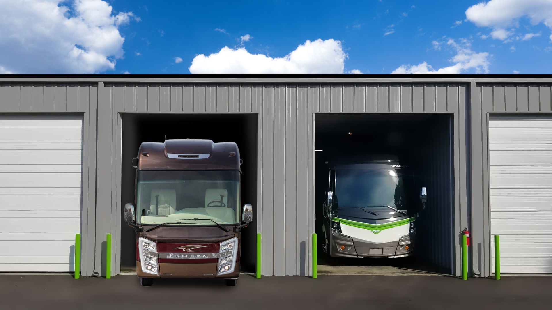 A man is holding a box in front of a warehouse.