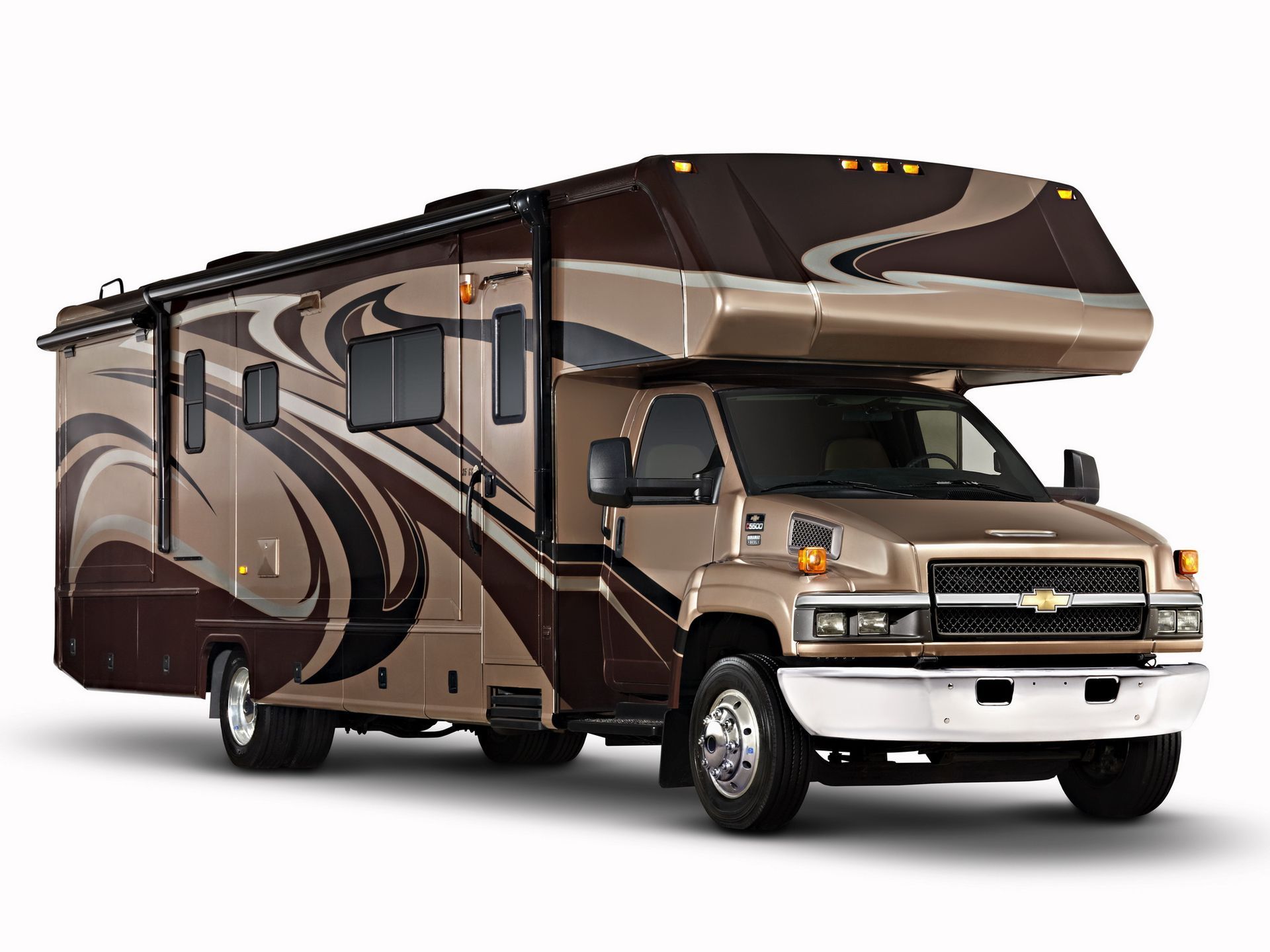 A brown and black rv is parked on a white background