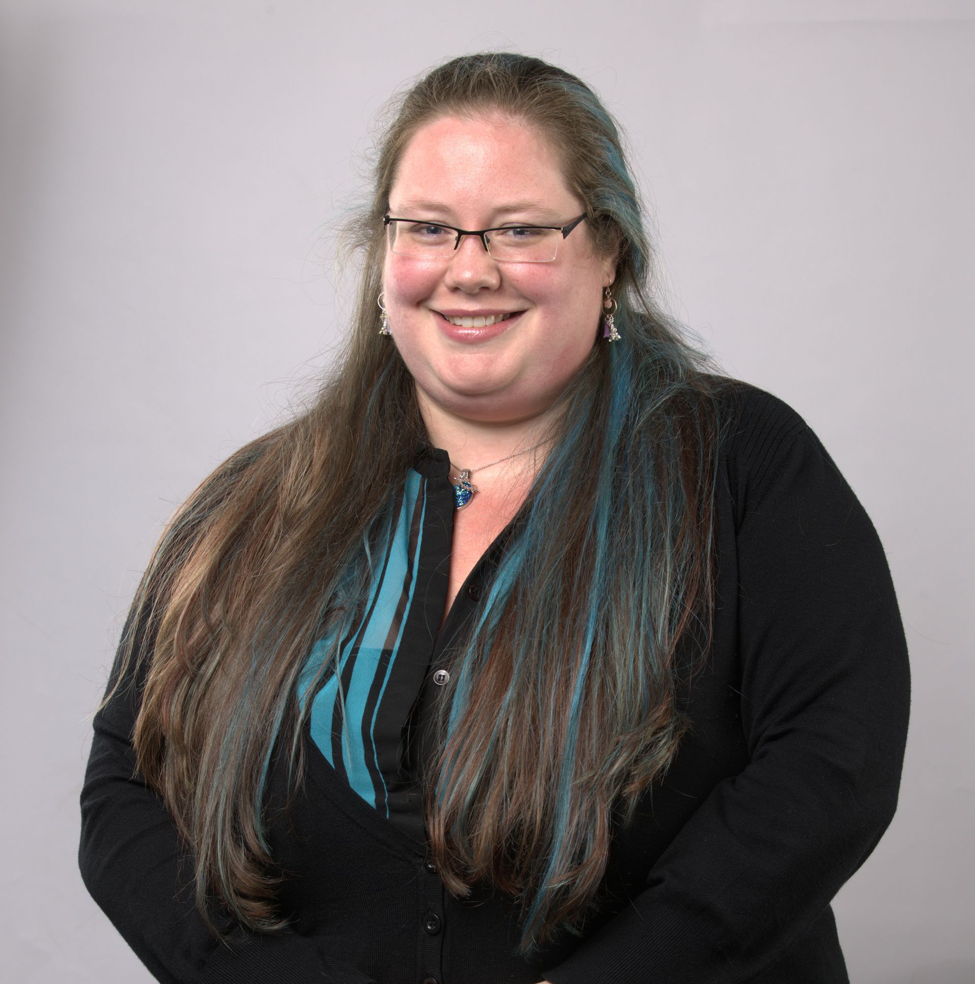 A purple icon of a person on a gray background.