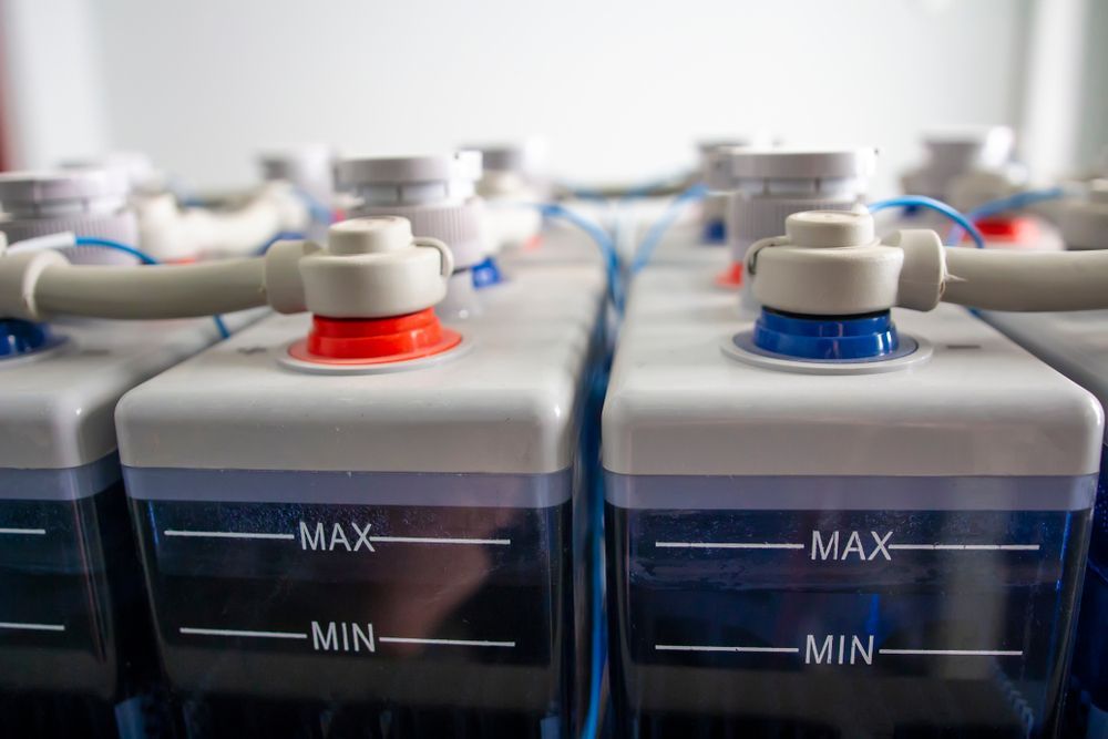 Rows of Car Battery Cells With Red and Blue Terminals — Edmonton Battery Centre in Mt Sheridan, QLD