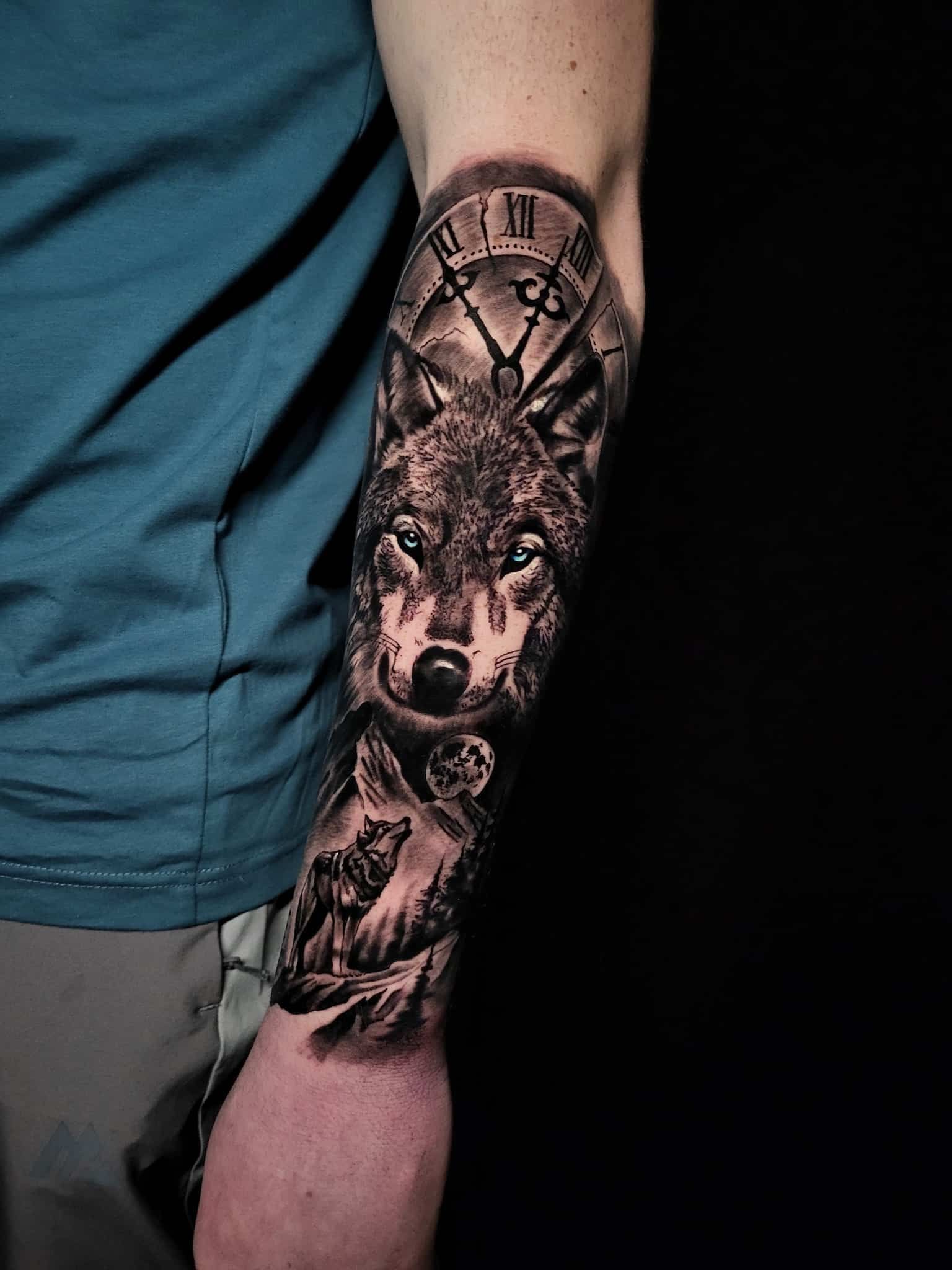 A tattoo of a pikachu and a light bulb on a person 's arm