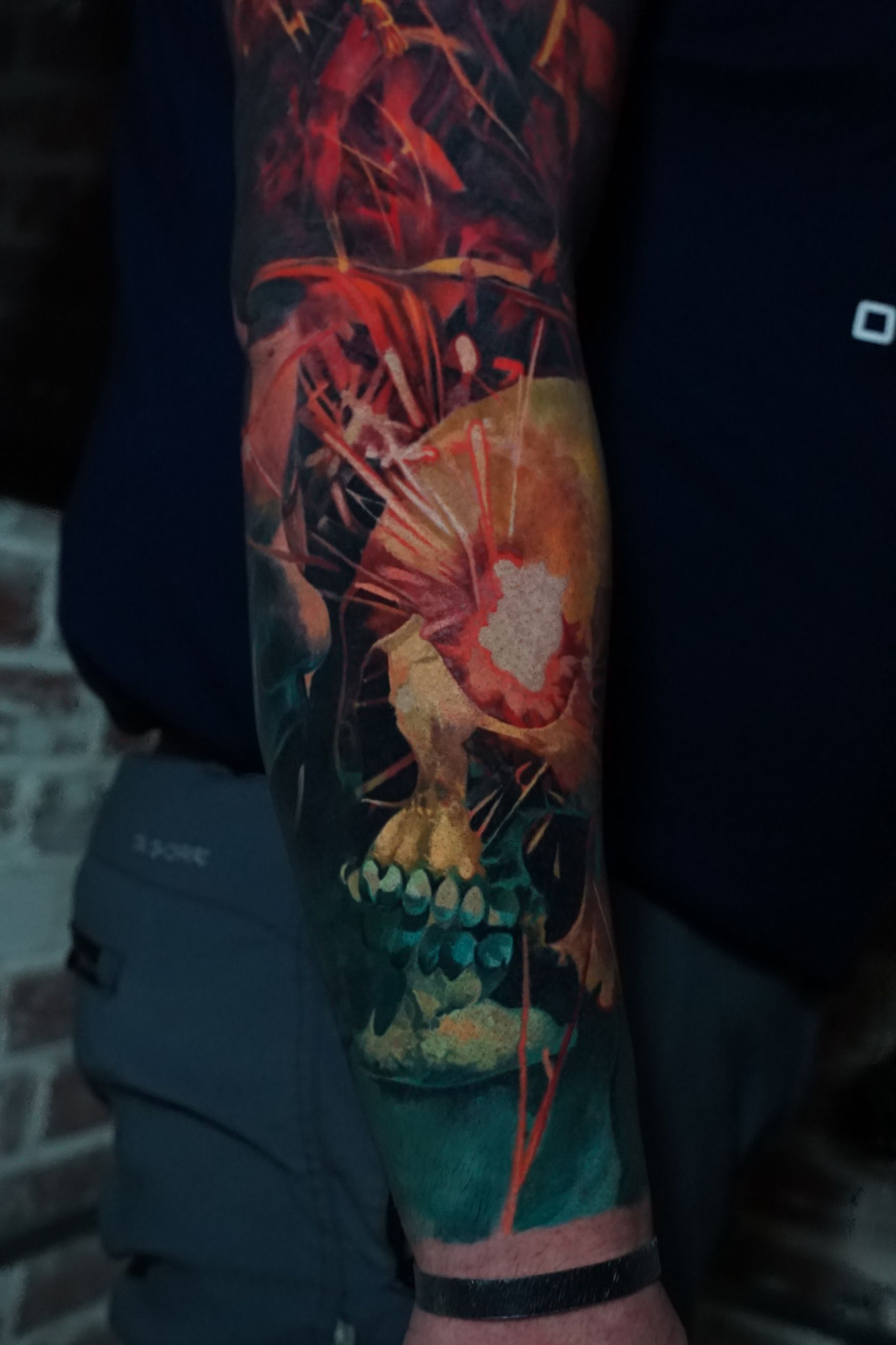 A close up of a person 's arm with a tattoo on it.