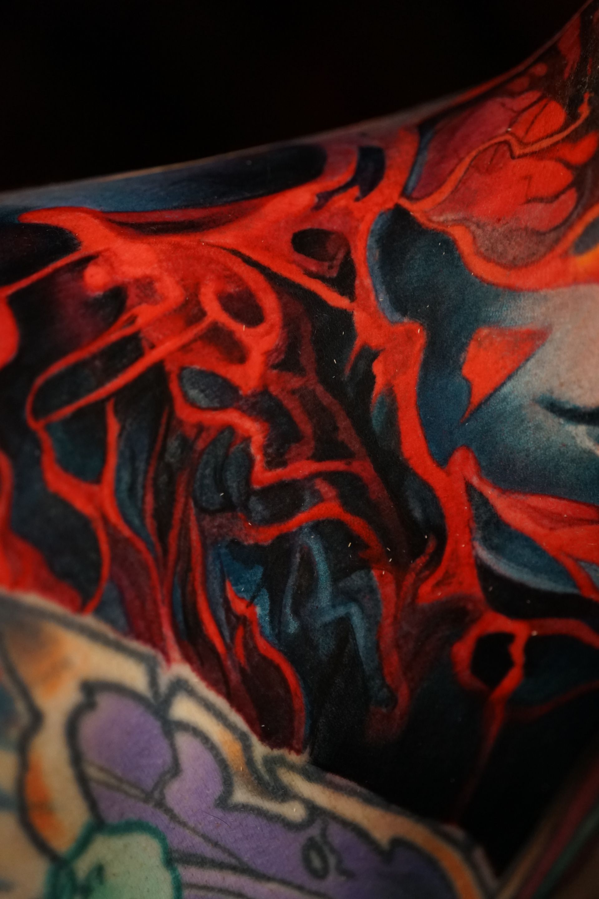 A close up of a tattoo on a person 's arm.