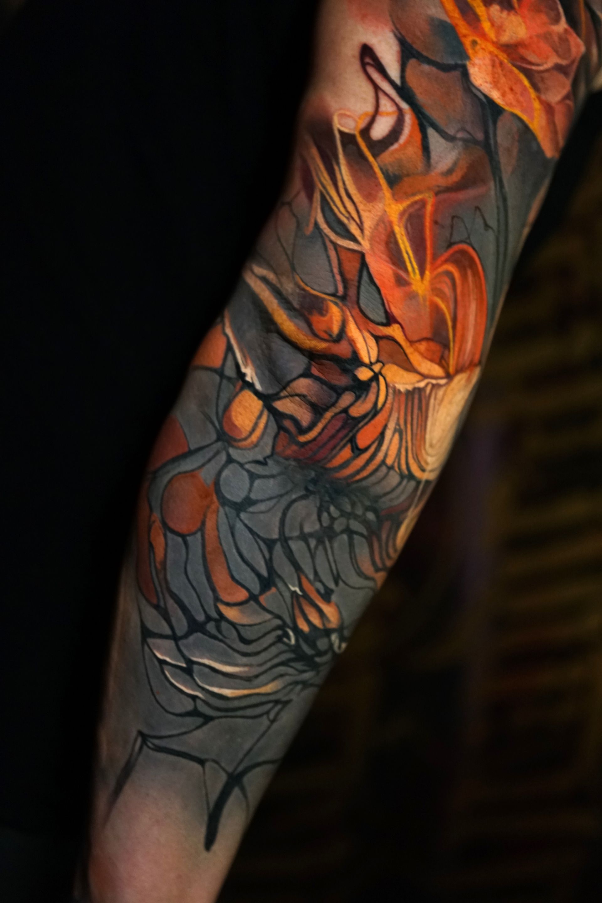A close up of a tattoo on a person 's arm.