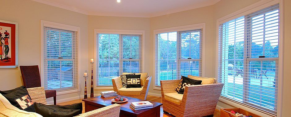 Living Room Filled With Furniture And Lots Of Windows — Atherton Glass In Atherton, QLD