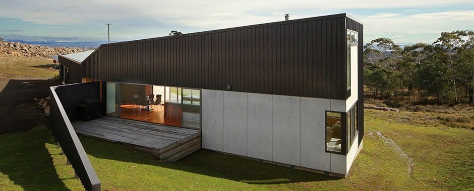 Living Room With A Lot Of Windows And A Couch — Atherton Glass In Atherton, QLD