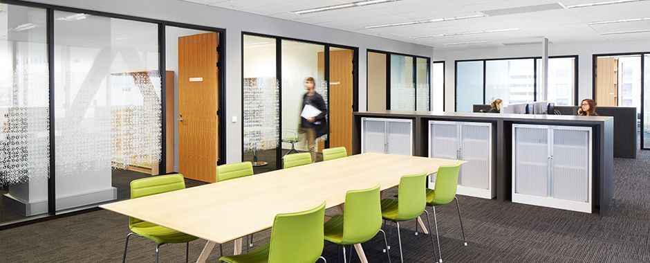 A Meeting Room With Table And Chairs With Glass Window Framing — Atherton Glass In Atherton, QLD
