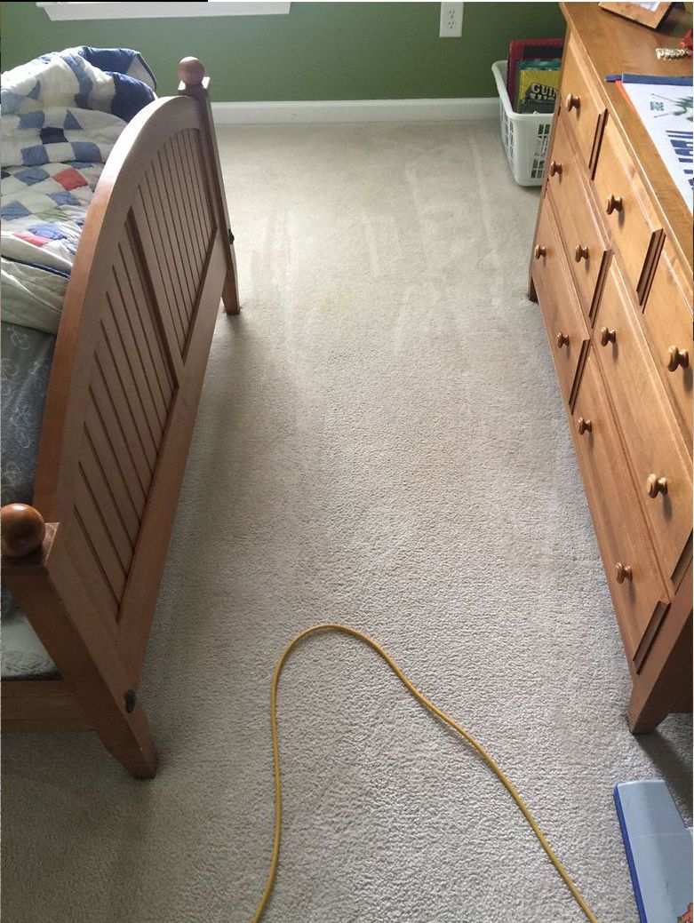 An after photo of a bedroom carpet