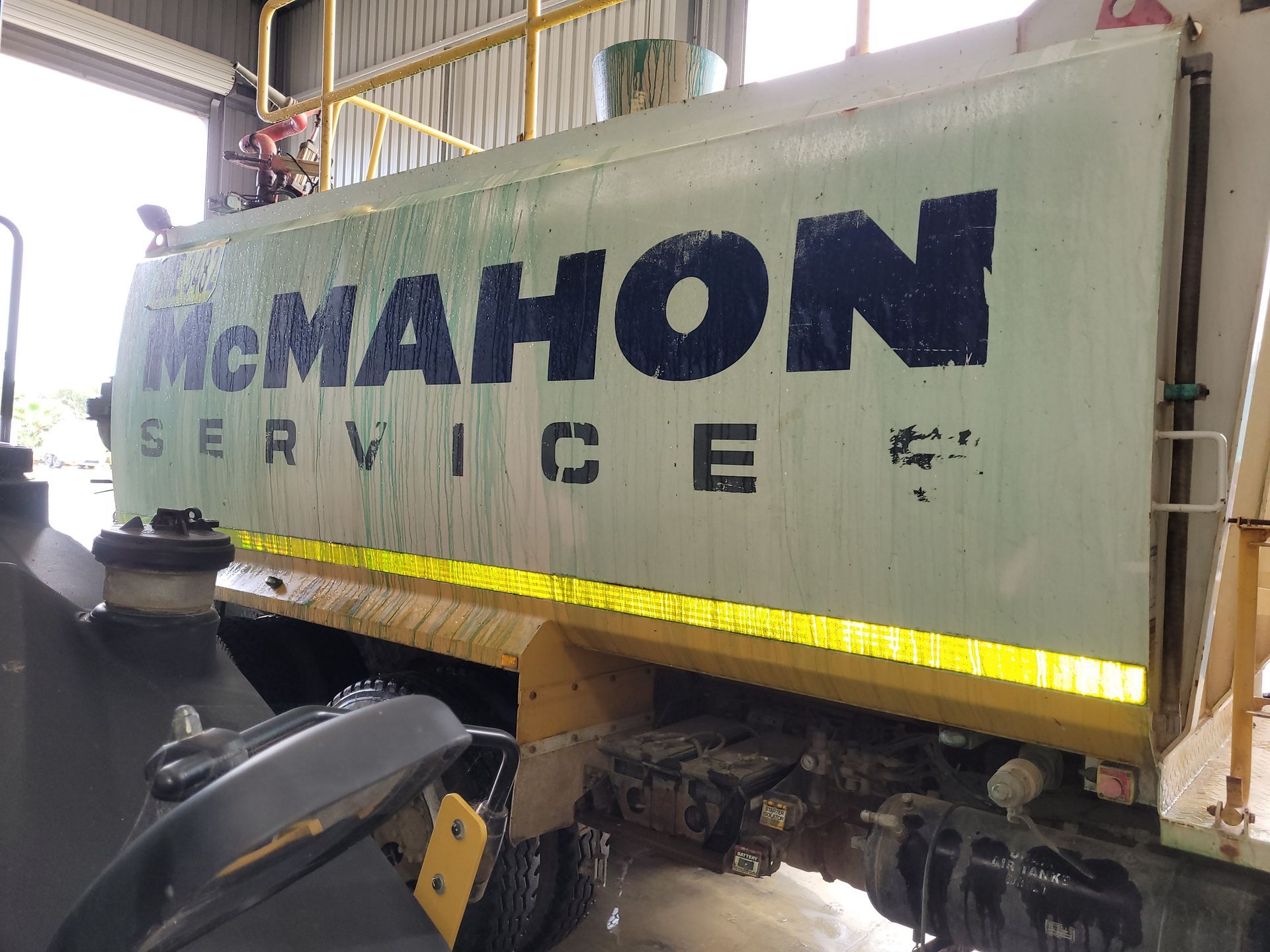 A truck with the word mcmahon on the side of it