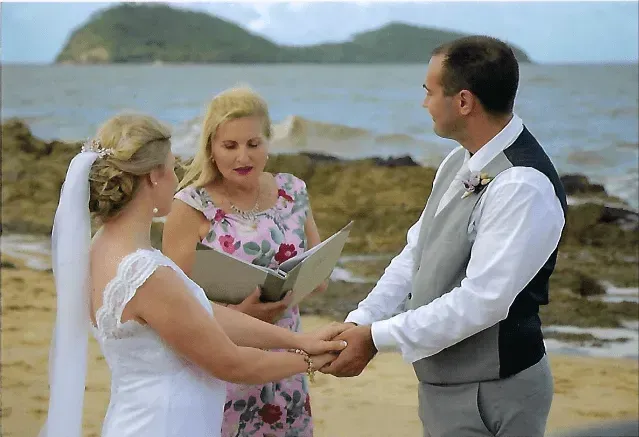 A Bride and Groom During Their Wedding on the Beach — GinaS Cairns Tropical Weddings in Parramatta Park, QLD
