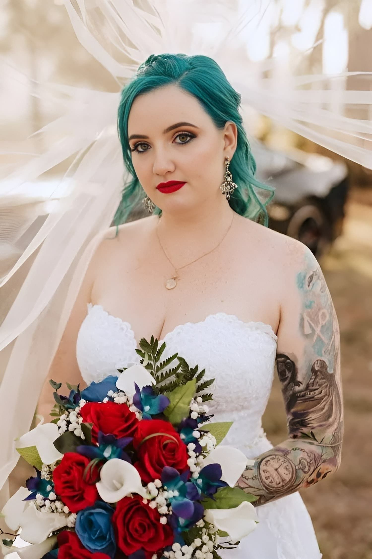 A Bride With Blue Hair is Holding a Bouquet of Flowers — GinaS Cairns Tropical Weddings in Parramatta Park, QLD