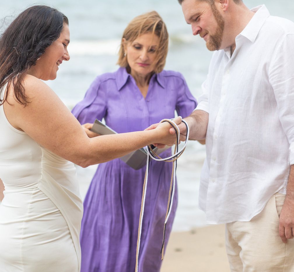 A Bride and Groom Are Getting Married in Front of a Tree — GinaS Cairns Tropical Weddings in Parramatta Park, QLD