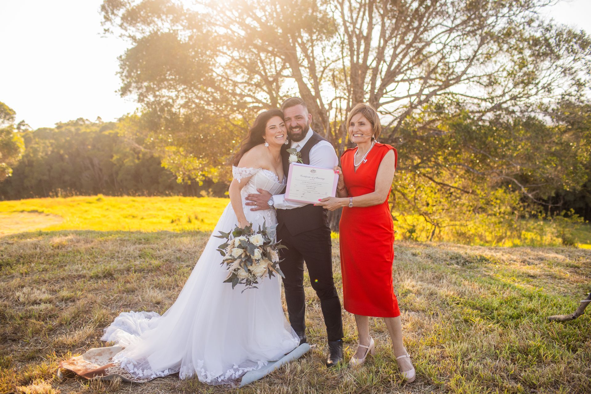 A Bride and Groom Are Posing for a Picture on Their Wedding Day — GinaS Cairns Tropical Weddings in Parramatta Park, QLD
