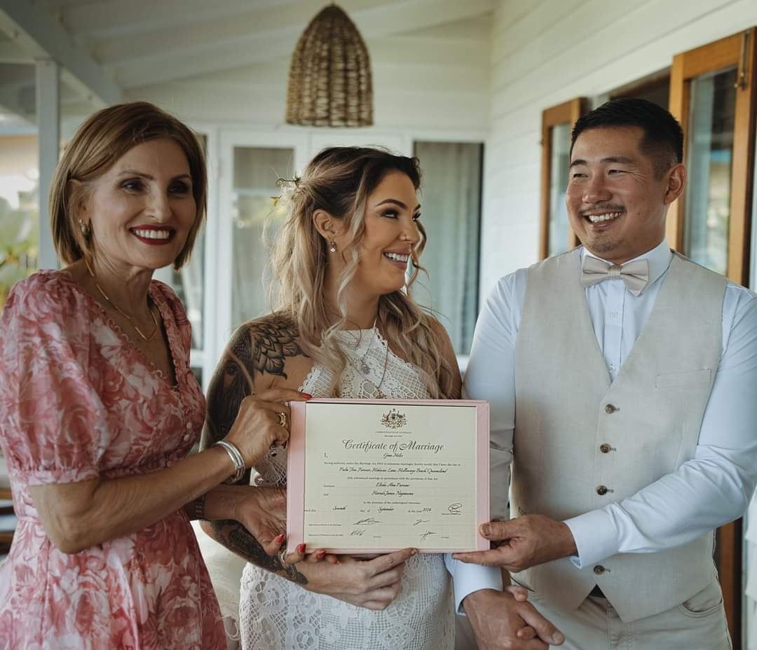 A Bride and Groom Are Posing for a Picture on Their Wedding Day — GinaS Cairns Tropical Weddings in Parramatta Park, QLD