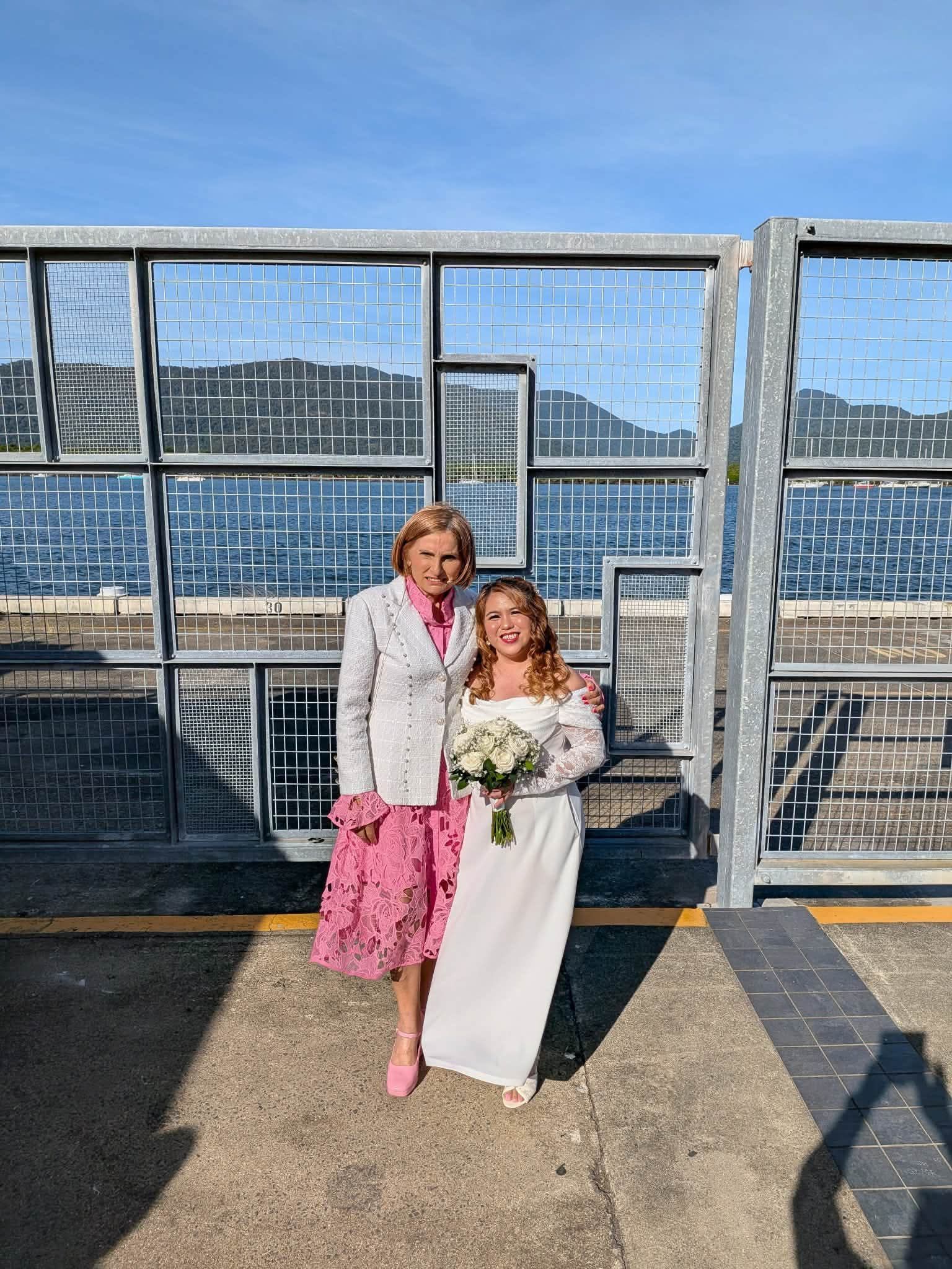 Two People Posing on a Rooftop Terrace — GinaS Cairns Tropical Weddings in Parramatta Park, QLD