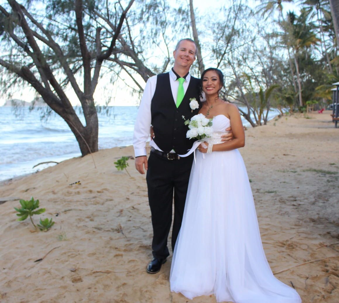A Bride and Groom Are Posing for a Picture on Their Wedding Day — GinaS Cairns Tropical Weddings in Parramatta Park, QLD