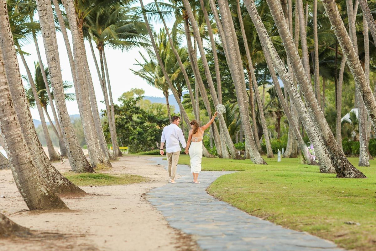 Man and Woman Walking Down a Path — GinaS Cairns Tropical Weddings in Parramatta Park, QLD