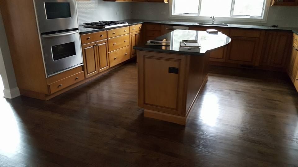 A kitchen with a large island in the middle of it.