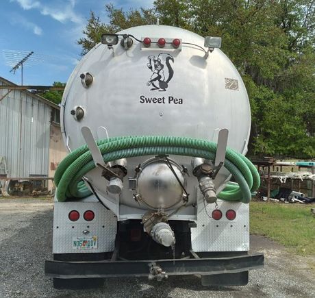 A Truck With White Tank — Lake Panasoffkee, FL — Meder’s Septic Tank