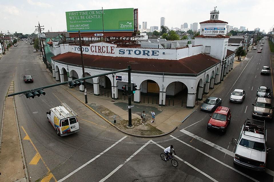 A busy intersection with a circle store in the background