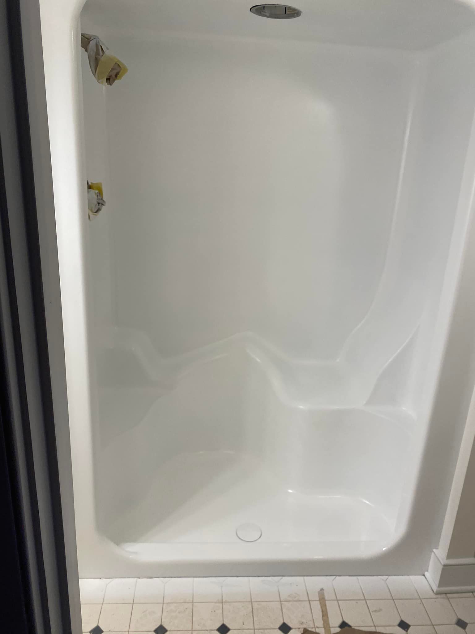 Image of a shower refinishing done by a company in Maryland. 