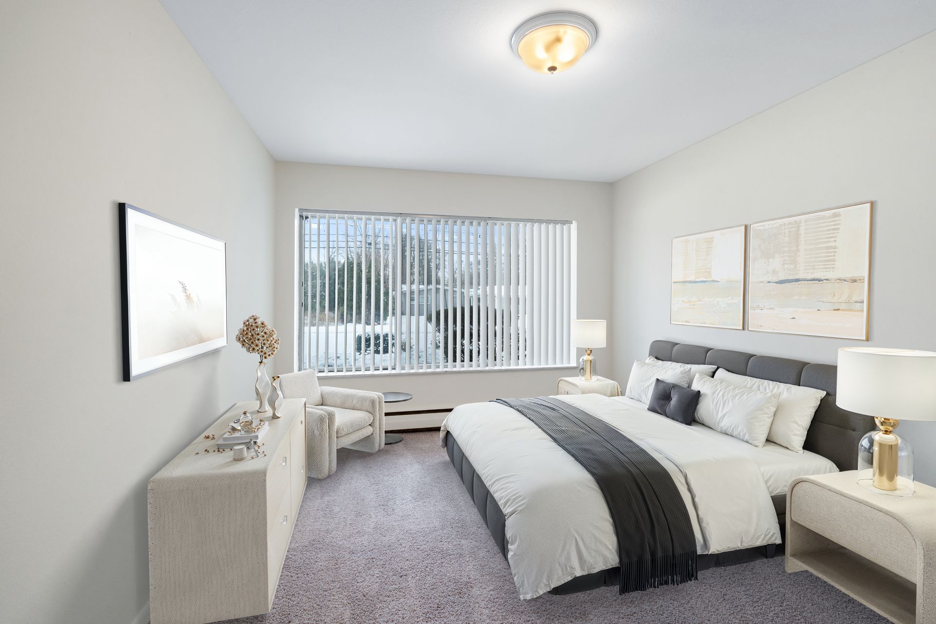 Photo of a bedroom with a very wide window that covers most of the room width