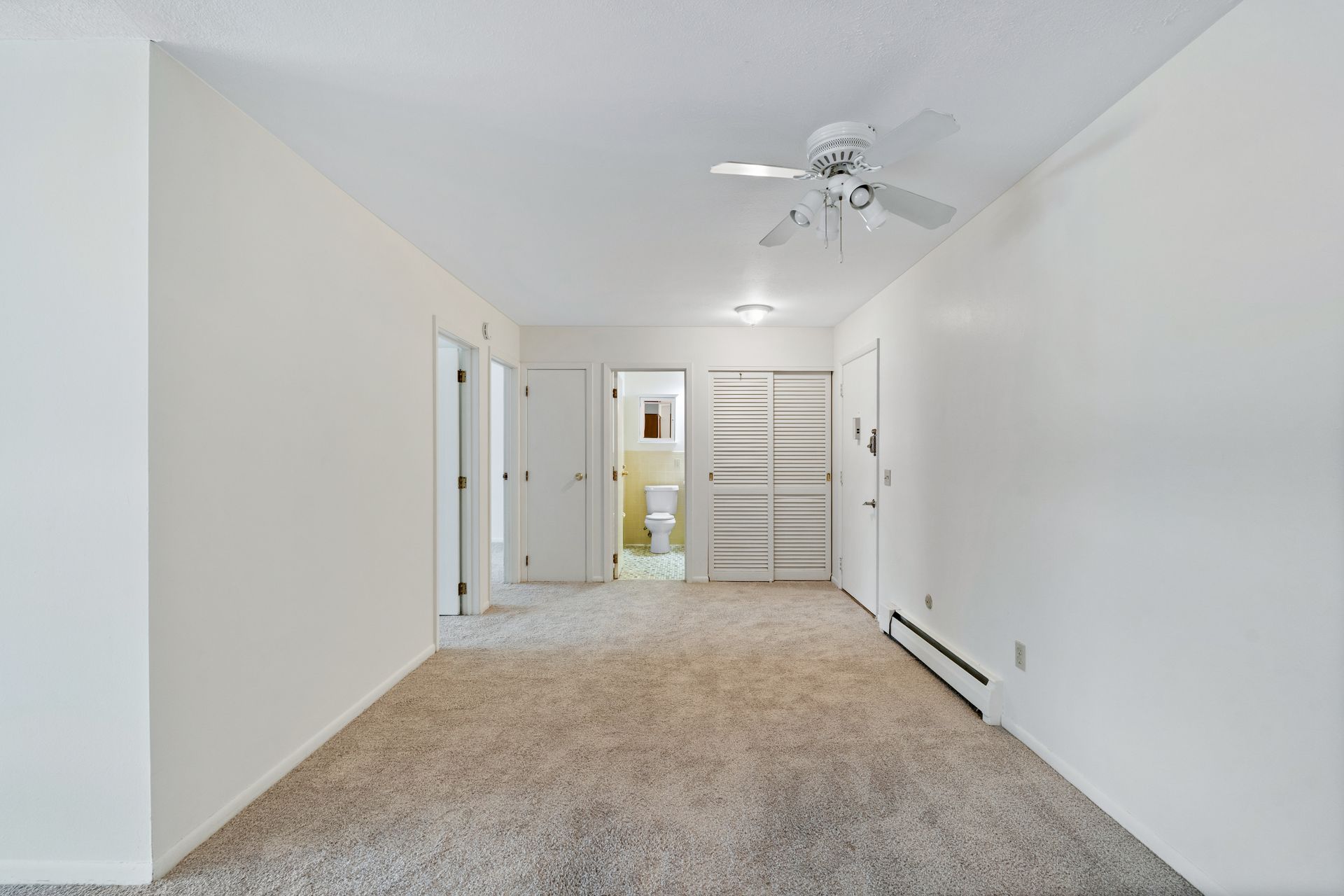 Photo of a dining area with a ceiling fan