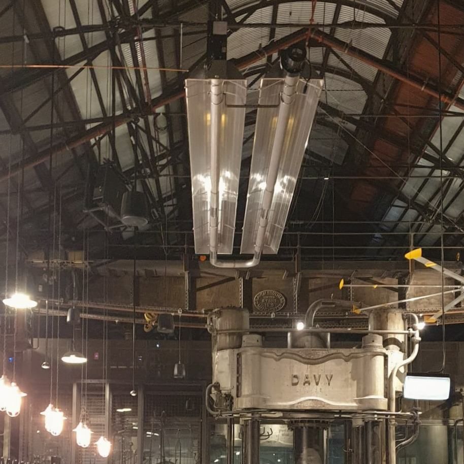 A Building With a Sign That Says Davy on It — Accurate Fitout Solutions In Alexandria, NSW