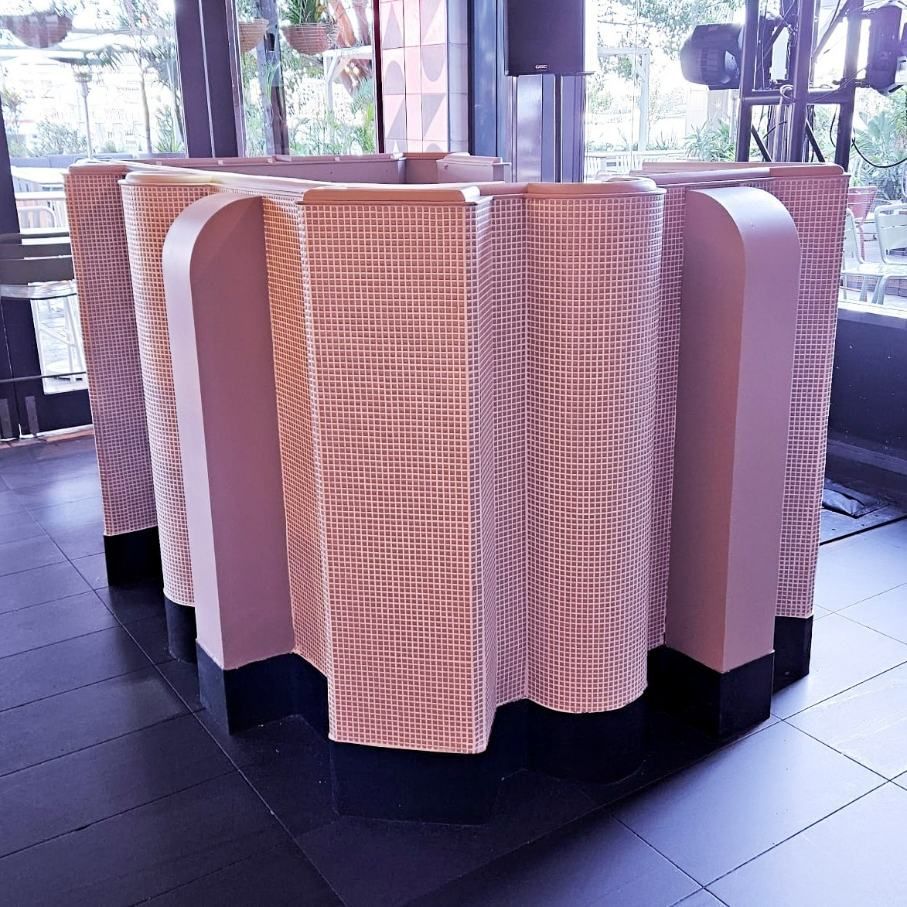 A Round Table With a Checkered Table Cloth on It — Accurate Fitout Solutions In Wetherill Park, NSW