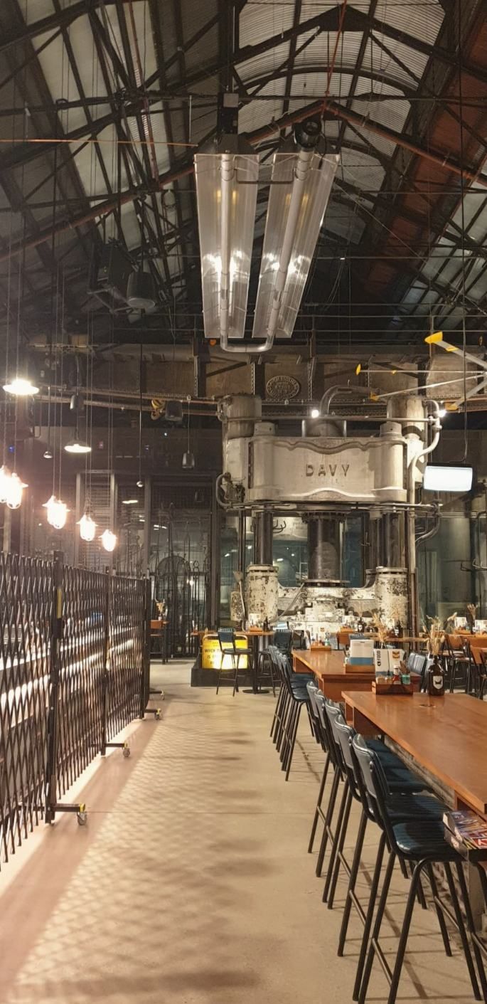 A Large Room With Tables and Chairs in It — Accurate Fitout Solutions In Wetherill Park, NSW