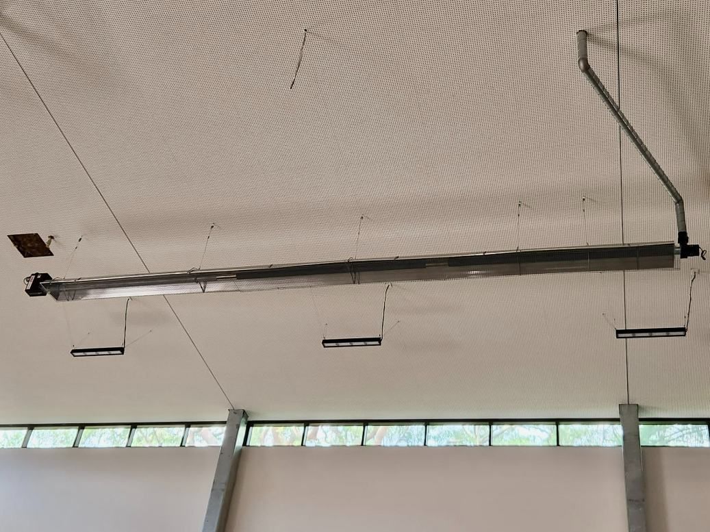 A Ceiling With a Lot of Wires Hanging From It — Accurate Fitout Solutions In Sydney, NSW