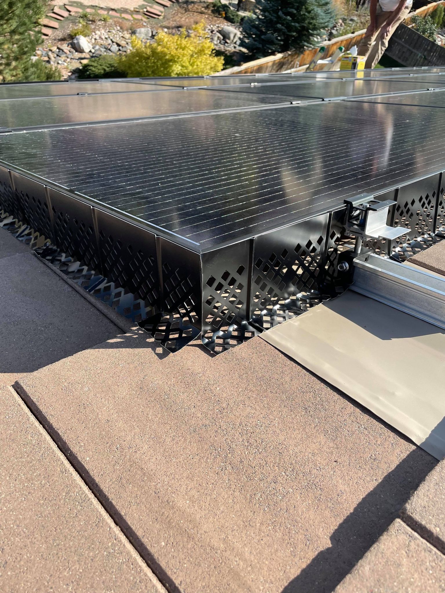 A close up of a solar panel on a roof.