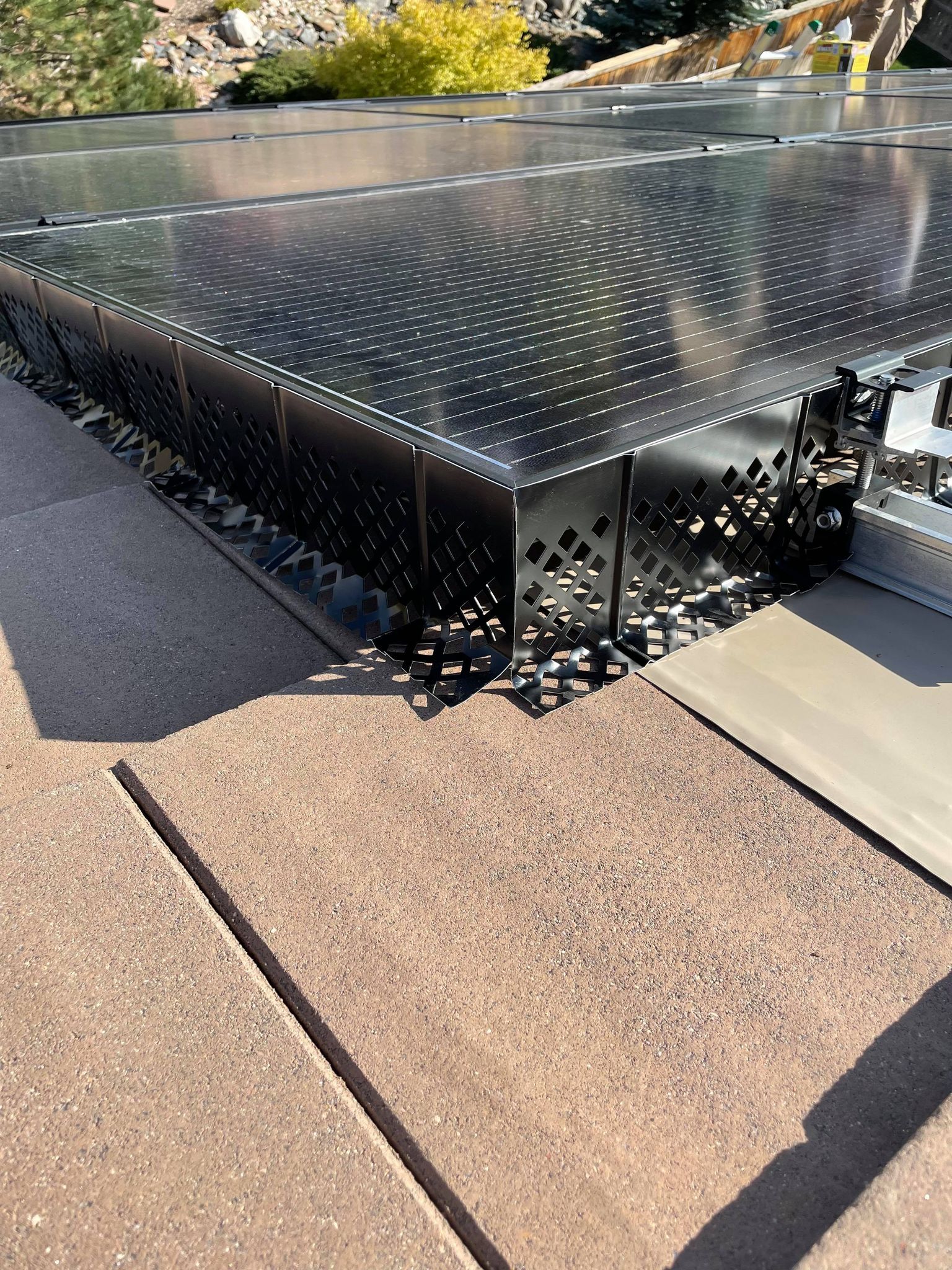 A close up of a solar panel on a roof.