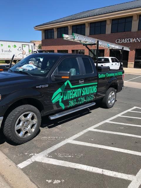 Black truck with ladder rack and 
