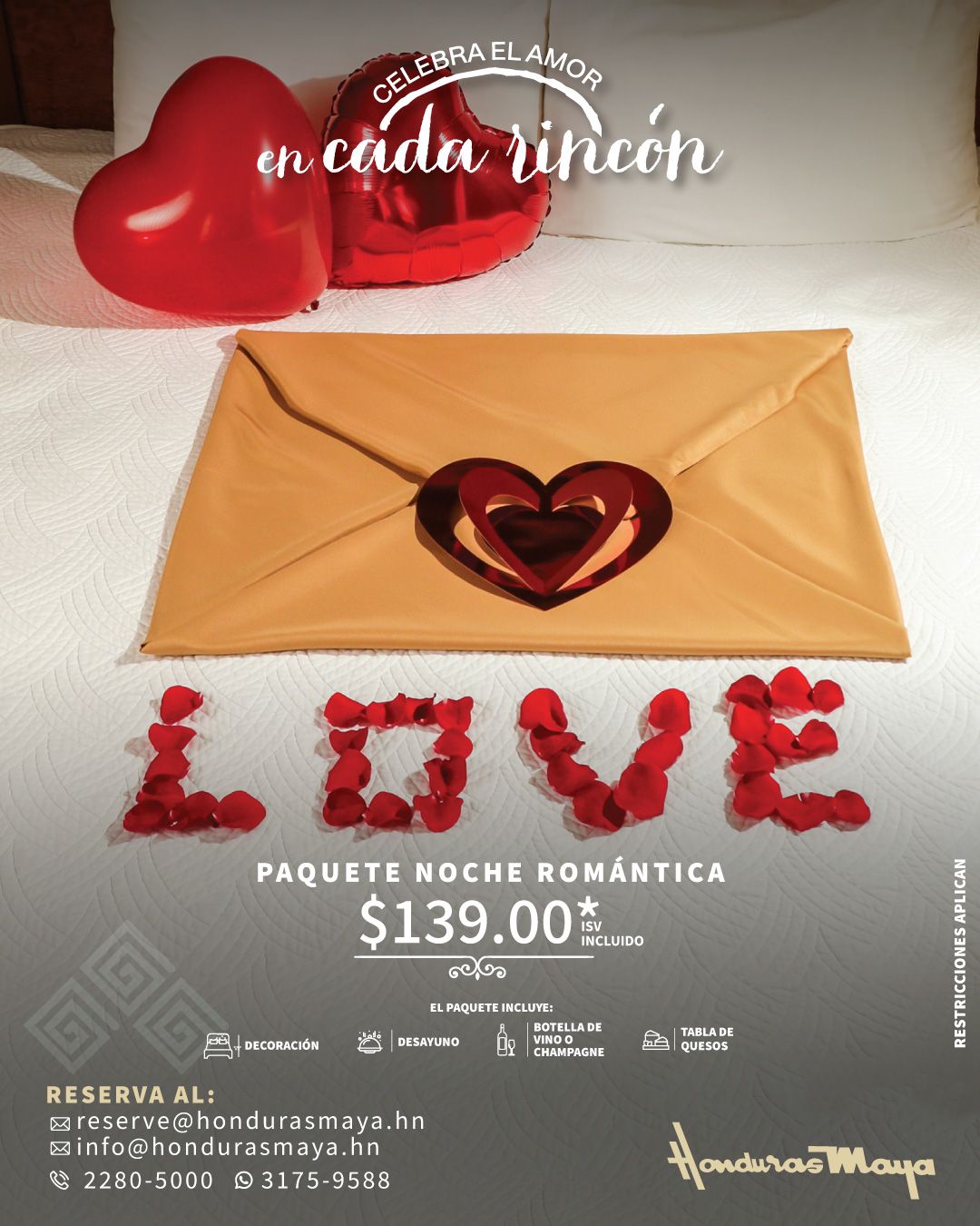 Un sobre con un corazón y la palabra amor em una habitación del Hotel Honduras Maya