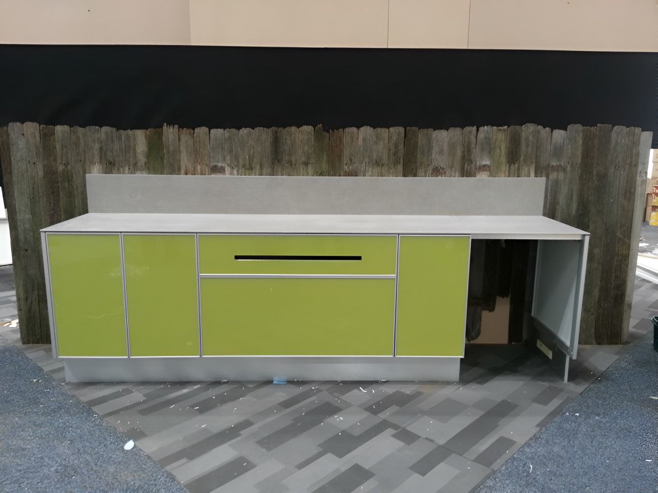 A Kitchen With Stainless Steel Appliances And A Large Island — The Right Kitchen Company In Berkeley, NSW