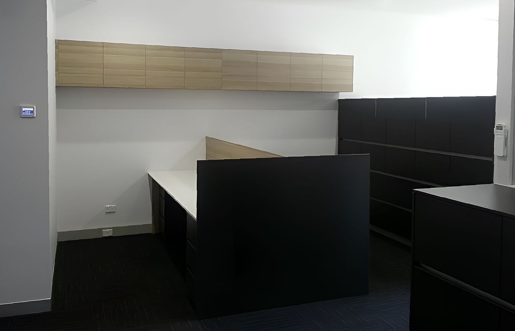 An office with large desk and cabinets on the wall — The Right Kitchen Company in Thirroul, NSW