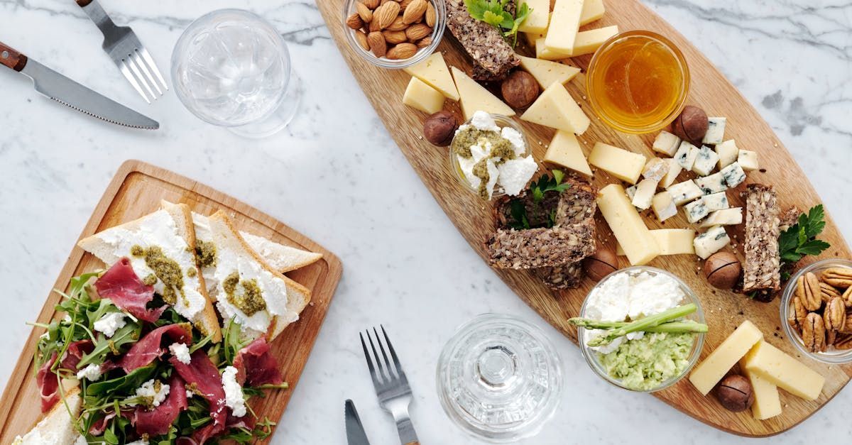 A wooden cutting board with a variety of food on it