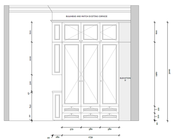 A person is holding a piece of wood in their hand.