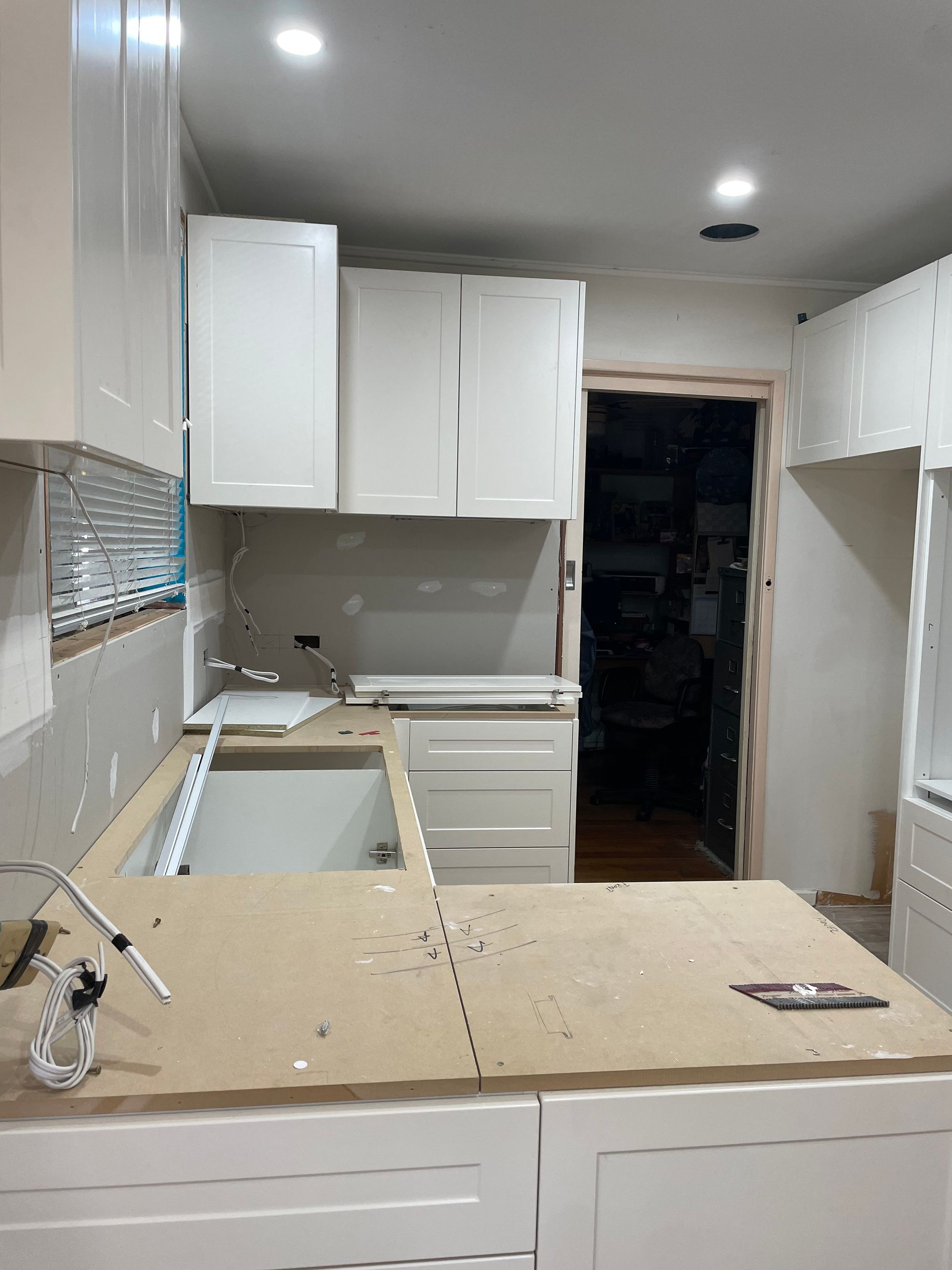 A wooden table with a lot of tools on it.