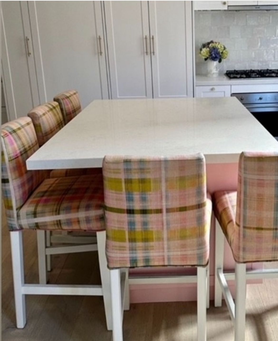 Woman at home choosing a color to paint the walls