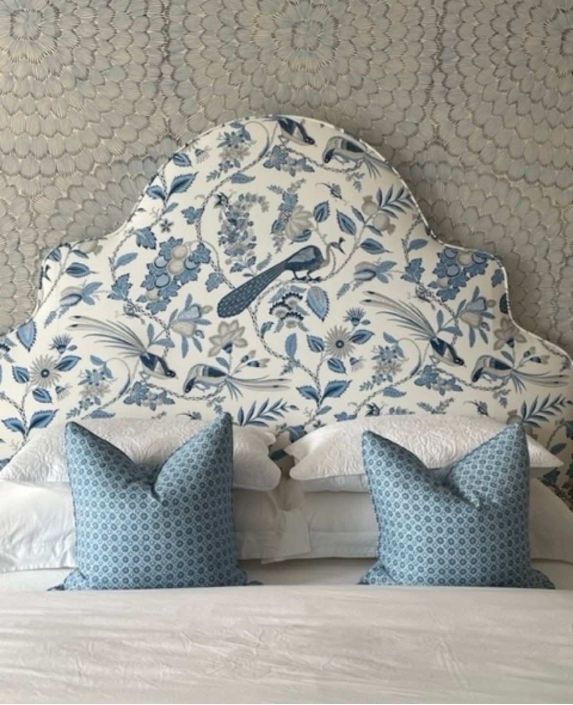 There is a tray with a cup of coffee on it on the couch.