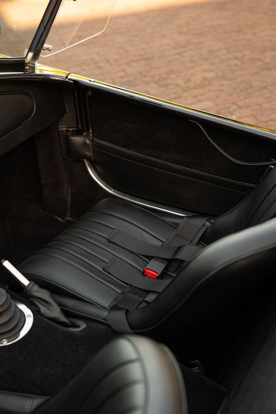 AC Cobra MKiv Mk IV mk4 4 retrim restoration respray repaint paint refurbish restore resto leather carpet black vaumol grained crushed how to trim redline engineering d:class dclass auto automotive golden hour seats steering wheel dashboard