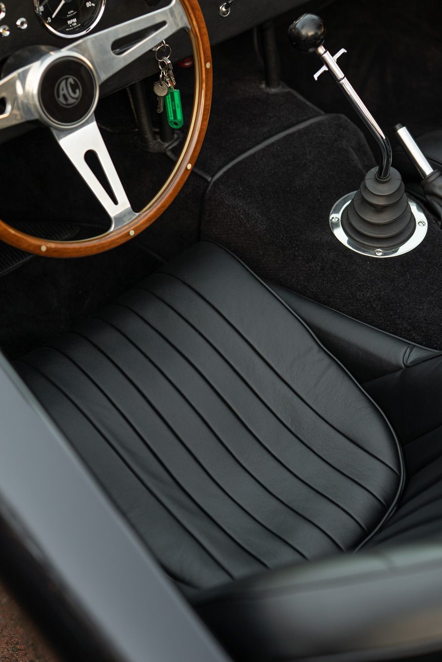 AC Cobra MKiv Mk IV mk4 4 retrim restoration respray repaint paint refurbish restore resto leather carpet black vaumol grained crushed how to trim redline engineering d:class dclass auto automotive golden hour seats steering wheel dashboard