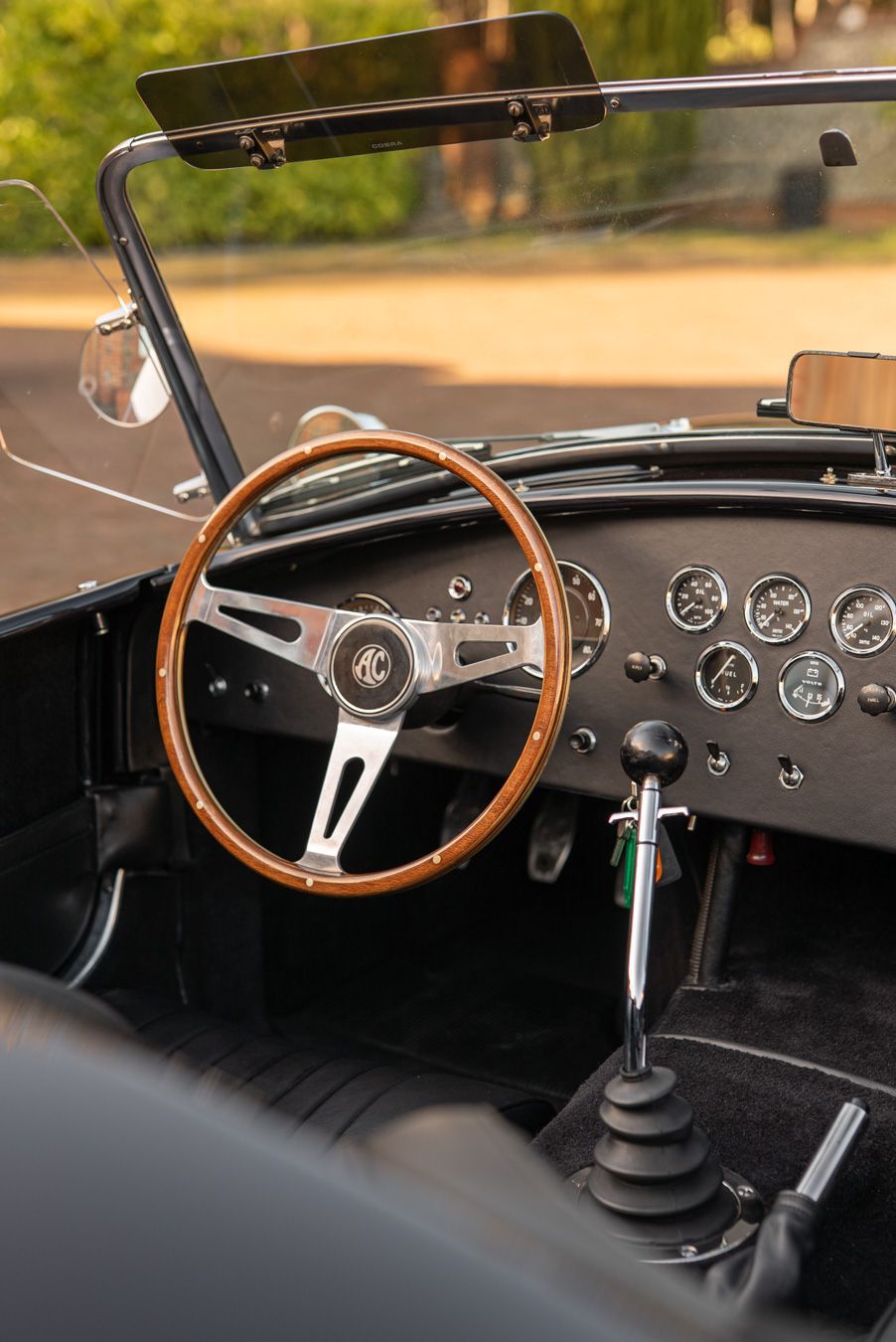 AC Cobra MKiv Mk IV mk4 4 retrim restoration respray repaint paint refurbish restore resto leather carpet black vaumol grained crushed how to trim redline engineering d:class dclass auto automotive golden hour seats steering wheel dashboard